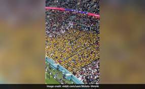 Football supporters yell “We Want Beer” during the alcohol-free FIFA World Cup first game in Qatar