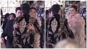 Karan Johar is hugged by Priyanka Chopra and Nick Jonas at an NMACC gathering days after she talked about being bullied in Bollywood