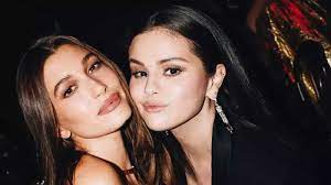 Selena Gomez claims Hailey Bieber informed her that she was receiving death threats and implores the public to stop the assaults.