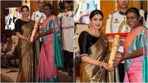 At the Padma Awards 2023 at Rashtrapati Bhavan, Raveena Tandon donned this gold sari. Observe her family photos