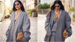 Sonam Kapoor struts the streets of London like her personal runway in a stylish grey plunge-neck look: each image