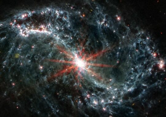 Webb Space Telescope Discovers Massive Star-Forming Complex in Galactic Genesis