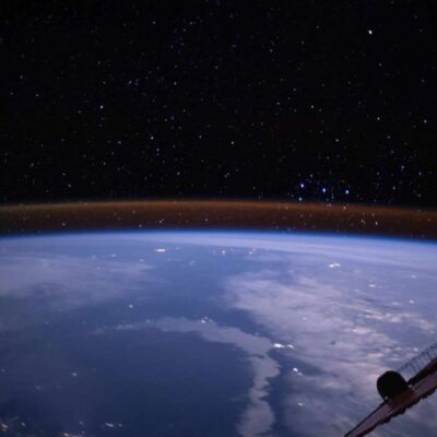 View this Stunning Image Captured from the International Space Station (ISS) to See Earth's Atmosphere Sparkle Gold