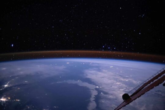 View this Stunning Image Captured from the International Space Station (ISS) to See Earth's Atmosphere Sparkle Gold